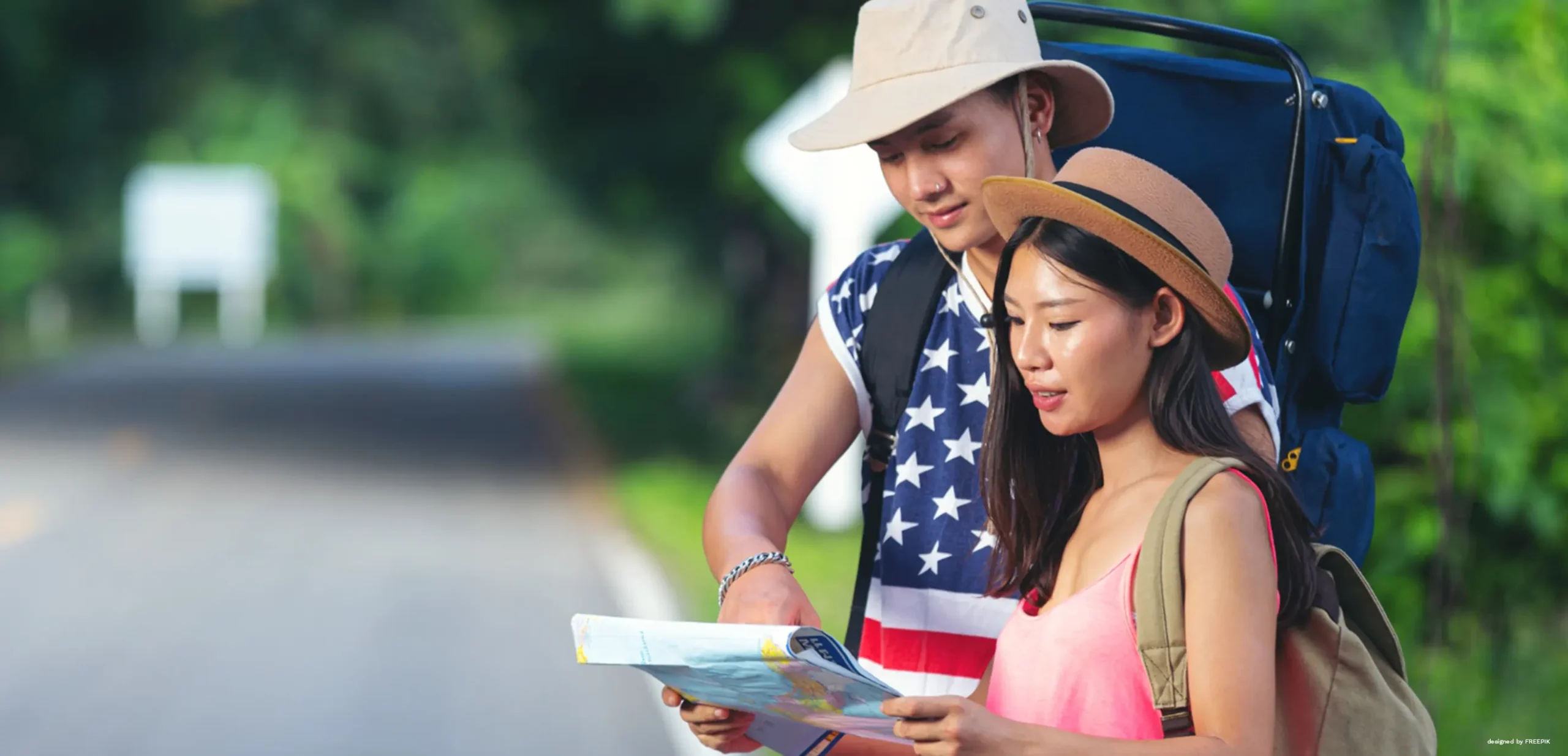 English for Travel: Two tourists; a woman and a man looking at the map at hand.
