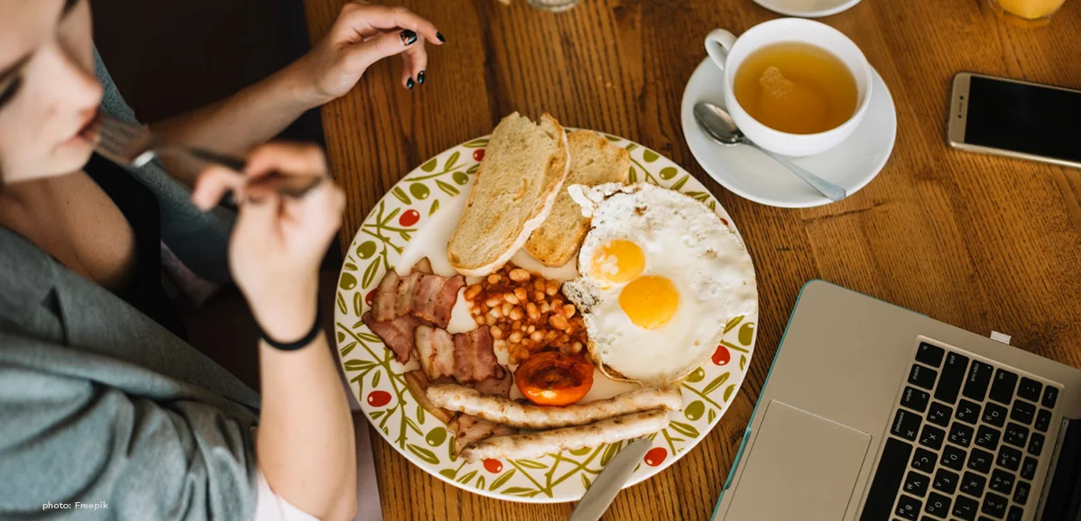 Talking About Your Daily Routine in English for Beginners 3, a lady eating her breakfast on the table